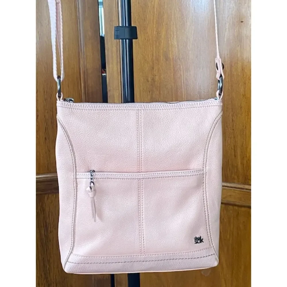The Sak Pink Pebbled Leather Crossbody Bag Adjustable Strap Multi Pocket Purse